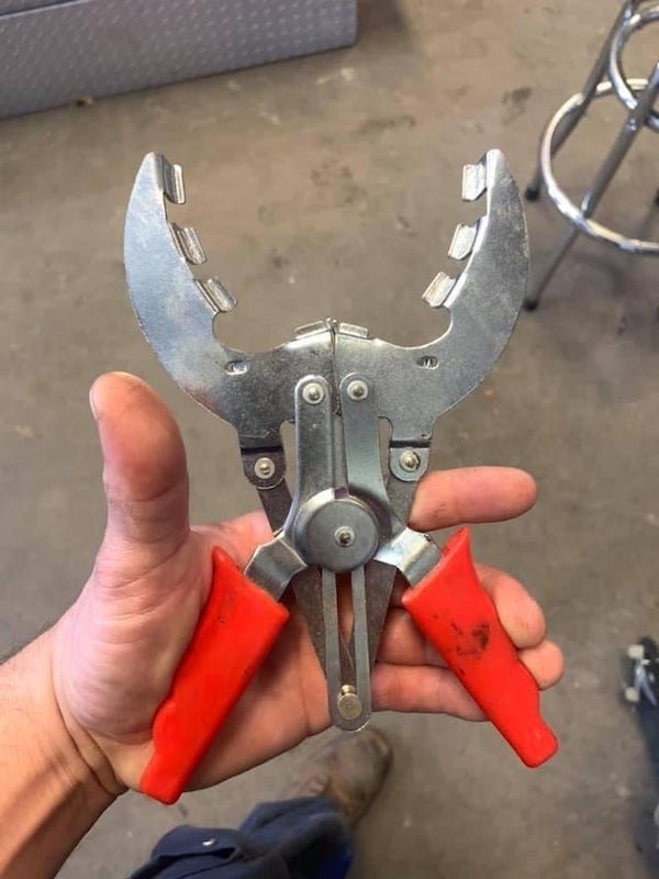 Florida/USA what is this odd plier?

A: Piston ring installation pliers