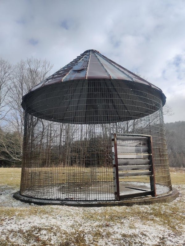 Giant Cage, about 16′ in Diameter, maybe 20′ Tall. NY Route 203.

A: Thats a corn crib.