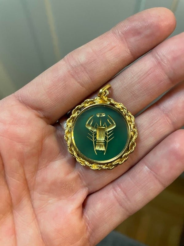 What is this pendant? Belonged to my mother, possibly astrology related

A: Not much of a mystery here. It’s the cancer zodiac sign, in picture as well as in the lying “69” symbol that represents it.