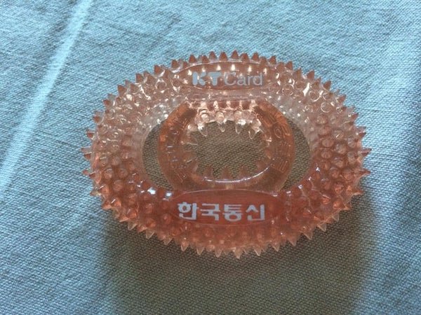 Some sort of promotional item. What is it used for?

A: I’m not sure of the scale, but it looks like an acupressure ring — meant to help improve circulation in your fingers.