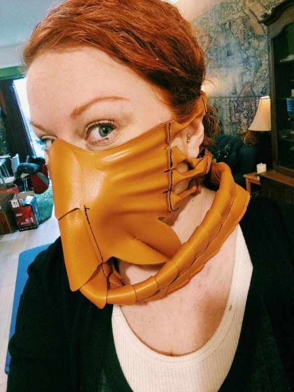 funny memes -- woman wearing leather sea creature face mask
