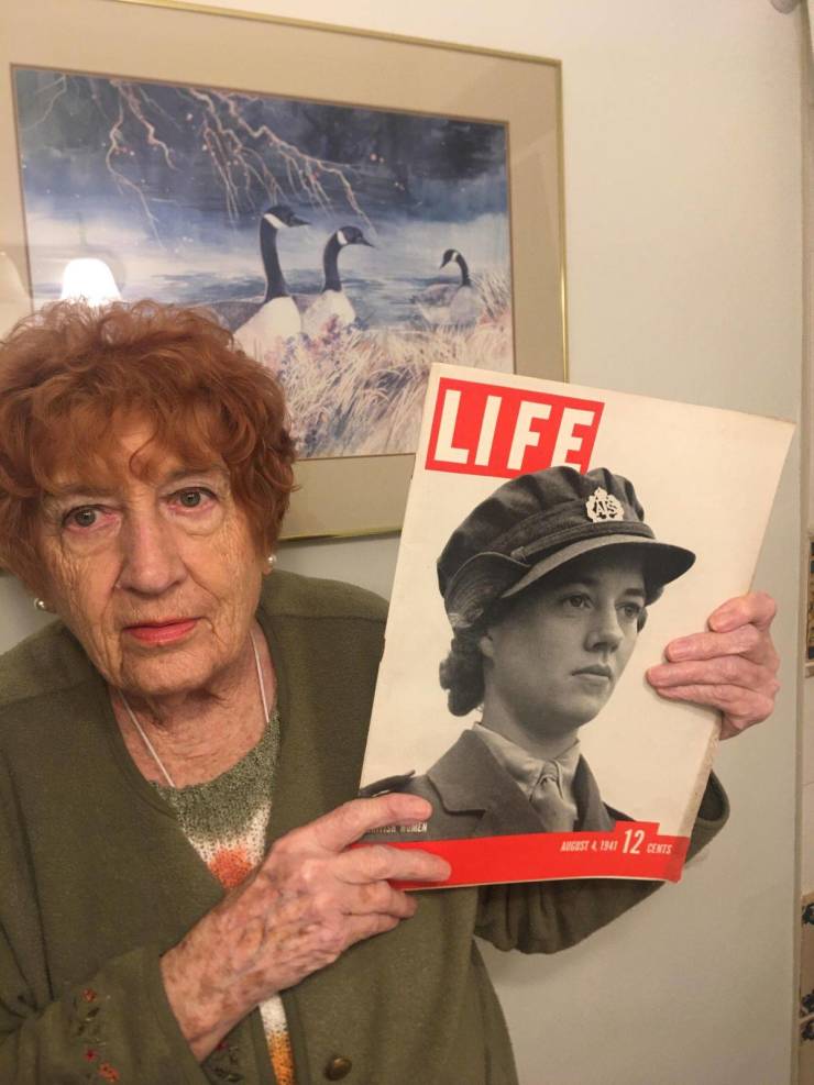cool pics - old woman holding copy of life magazine