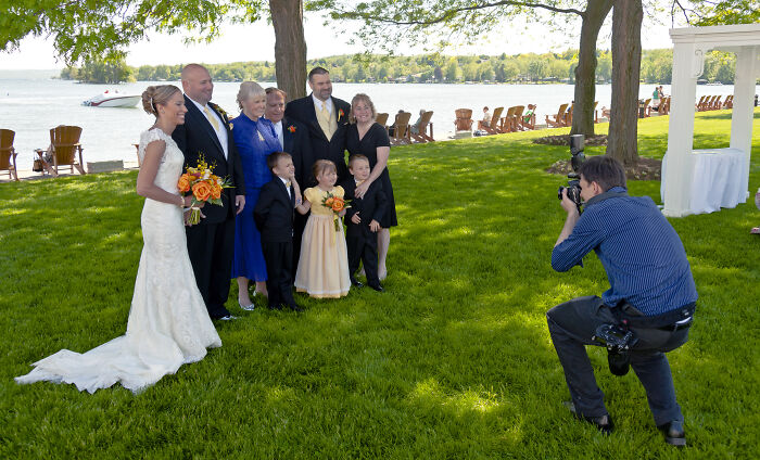 Be nice to the wedding photographer. If you're not I include all the awful photos of you & sometimes even add some weight in photoshop