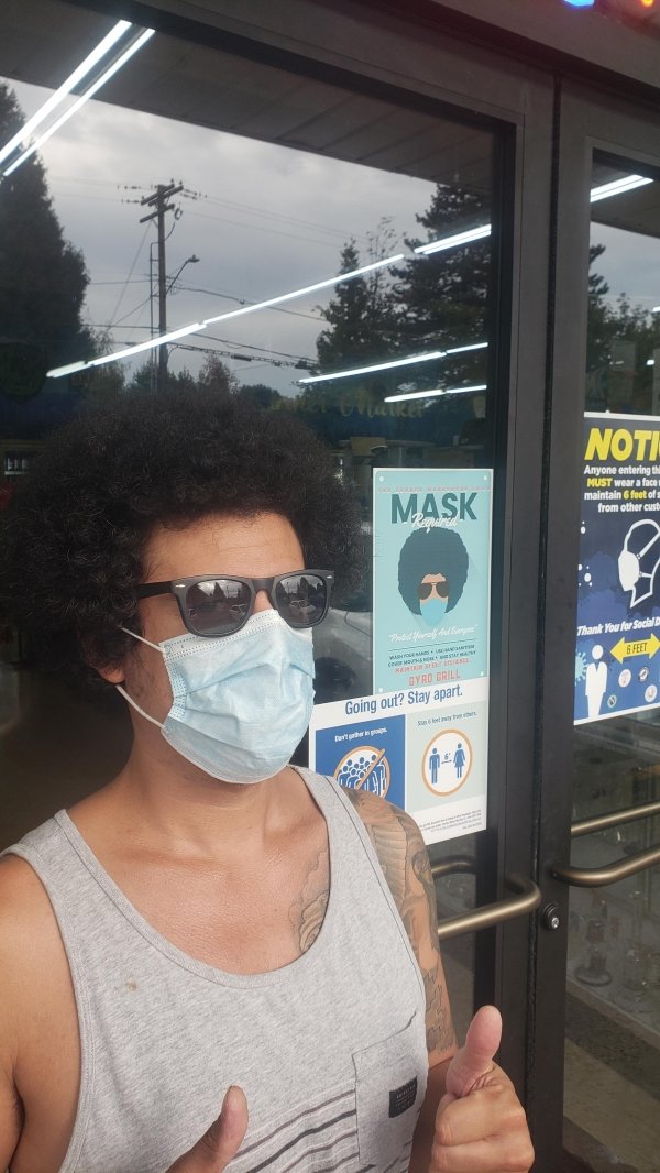 funny memes - Couldnt Help It - guy wearing mask with afro looks just like picture of mask sign