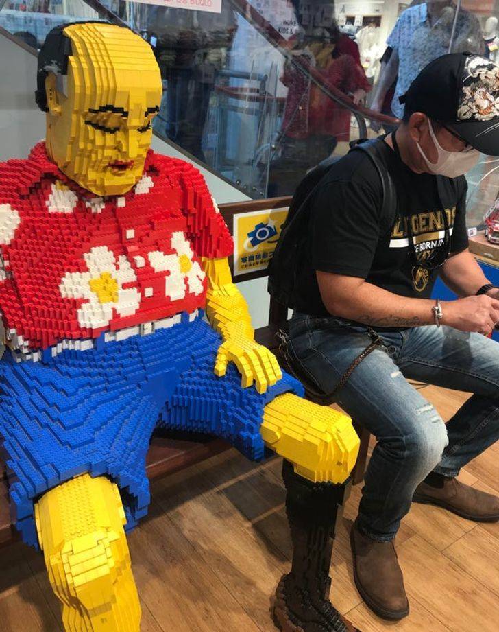 “My human dad waiting next to a Lego dad in a department store in Japan.”