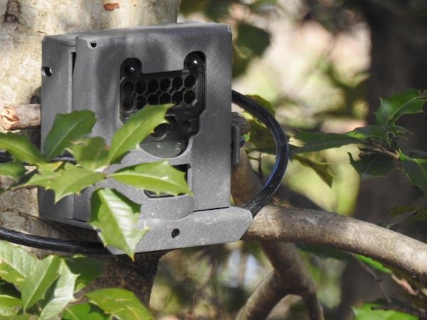 A grey device with a cord on it.. I thought it was a game camera of some sort but I don’t think it is. Found at a park

A: Trail cameras are not always for hunters. they use them to check wildlife numbers and interactions too. It’s most certainly a cam