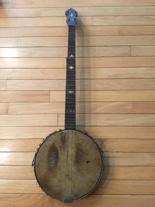 A friends banjo passed down for generations. Any way to discover the maker?

A: Pretty sure it’s a circa 1910 C. Bruno & Sons model. Made in New York. A lot of those would have slight variations in hardware or decoration.