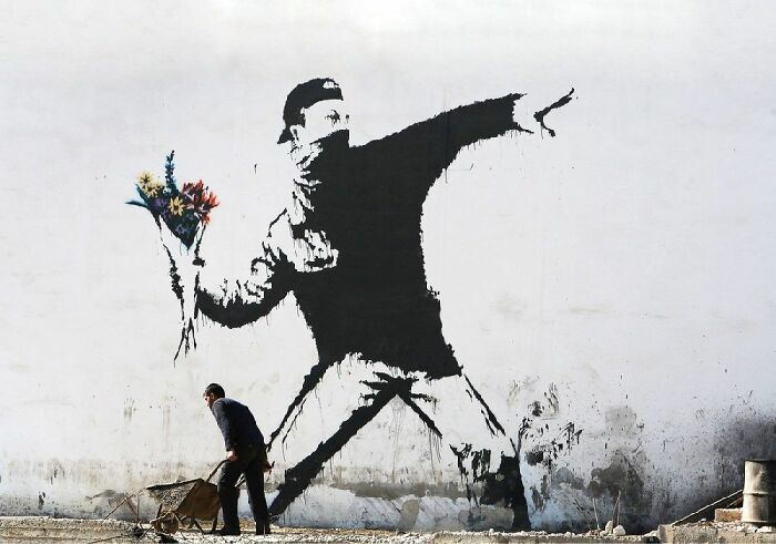 Til That Graffiti Artist Banksy Sought To Trademark His Image Of A Protester Throwing Flowers. The Trademark Office Denied It On The Grounds Of Him Having No Interest In Selling His Work. In The Ruling They Used A Quote From One Of Banksy's Books: "Copyright Is For Losers"