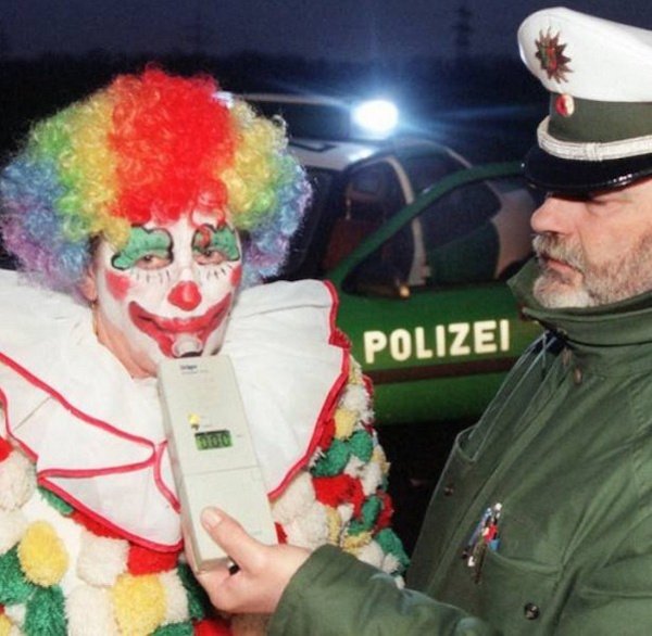 funny pics -- clown failing a roadside sobriety test