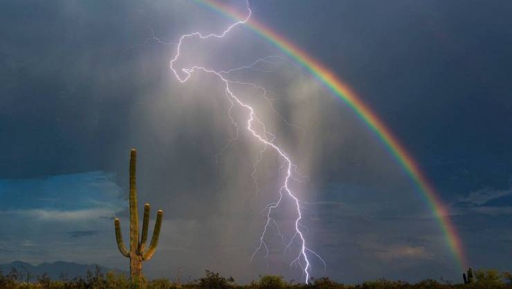 lightning striking a rainbow