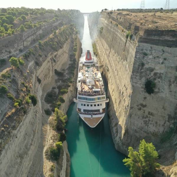 cool pics - giant cruise ship between two cliffs
