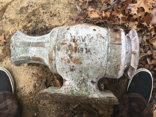 What is this thing? it is likely nautical in nature as i live on cape cod, its just sitting in my yard. about 18” long, and VERY heavy, 75 lbs. i would guess.

A: It’s a capstan winch. Probably off a decommissioned ship. Navy historical museum might want it.