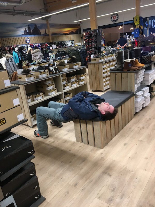funny pics and memes - man sleeping in shoe store waiting for wife