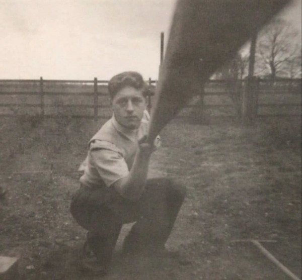 “Man takes a selfie in 1954 by using a piece of wood to click the shutter.”