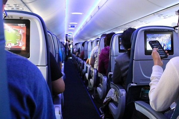 airline employees spill the beans - Airplane interior / cabin photo