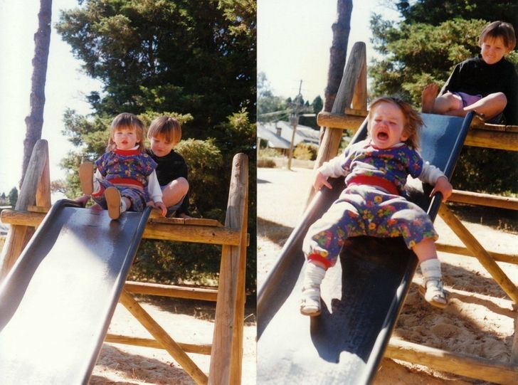 funny sibling pics - kid kicking his sister down a slide