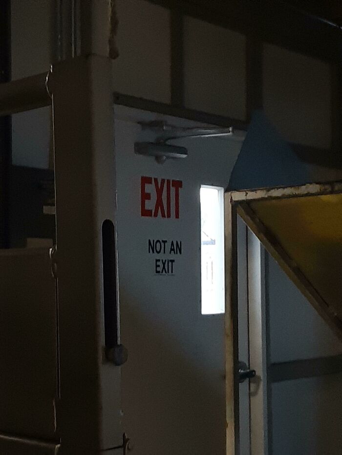 funny construction fails - door labeled exit says this door is not an exit