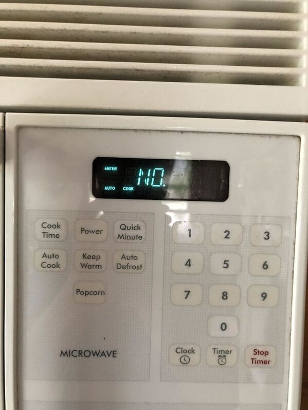 my microwave is disagreeing with me again - Enter Auto Cook Cook Time Power Quick Minute 1 N 3 Auto Cook Keep Warm Auto Defrost 4 5 6 Popcorn 7 8 9 0 Microwave Clock Timer Stop Timer
