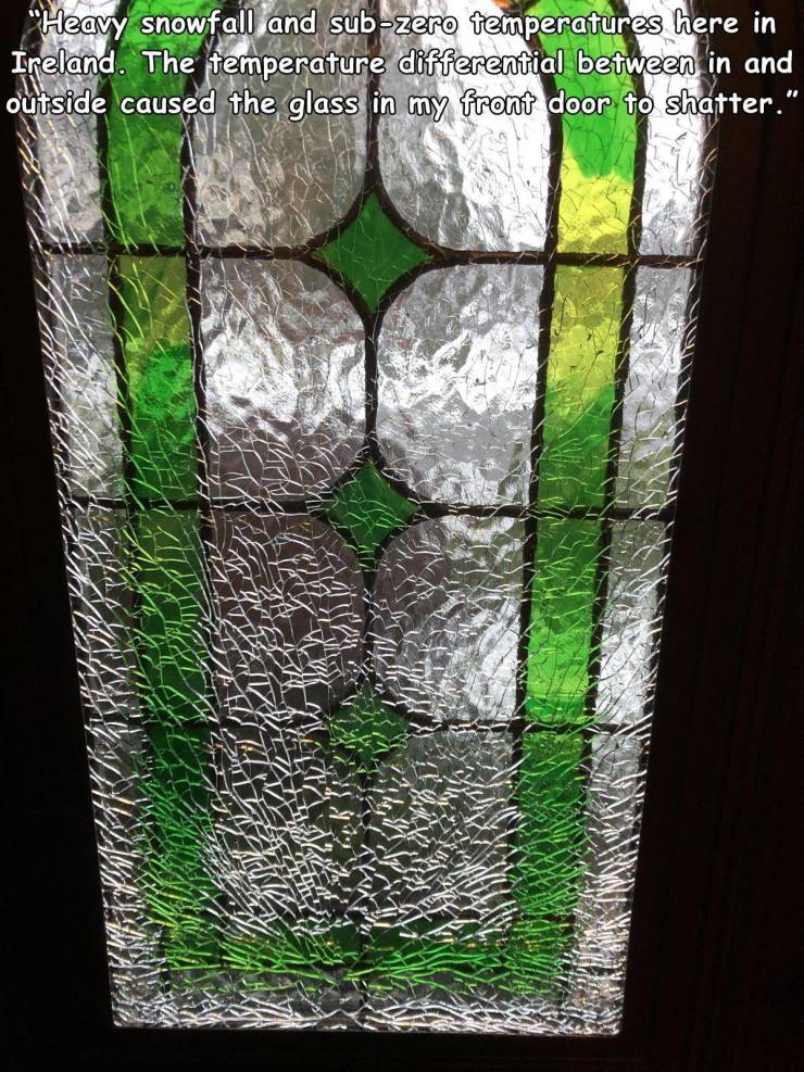 stained glass - "Heavy snowfall and subzero temperatures here in Ireland. The temperature differential between in and outside caused the glass in my front door to shatter."