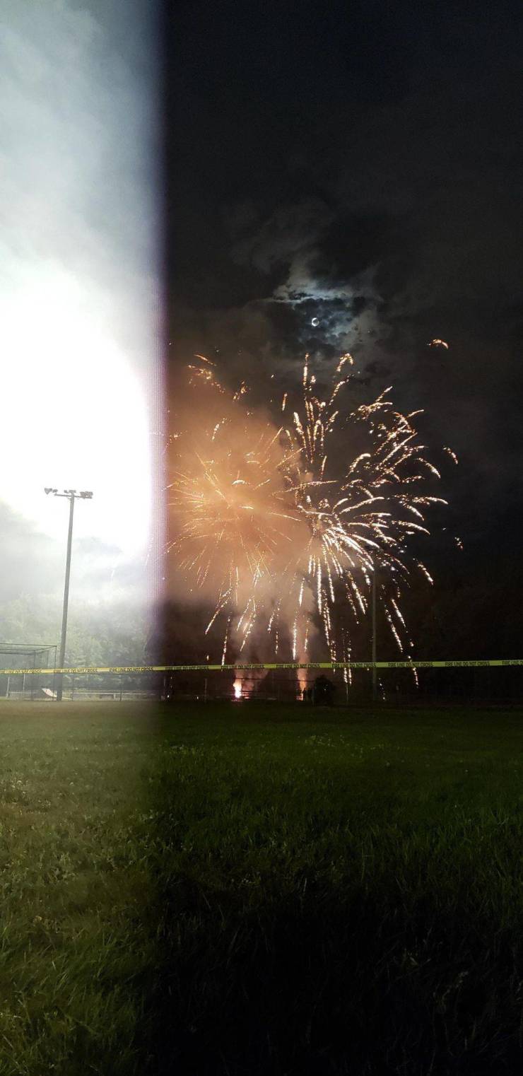 “A picture I took partially through a firework's flash. Looks like it's day and night at the same time.”