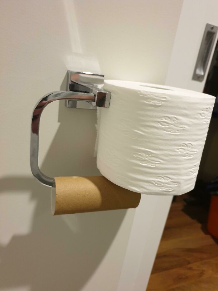 funny bad roommate pics - toilet paper roll installed incorrectly