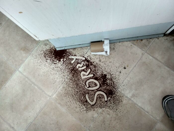 funny bad roommate pics - sorry spelled out in spilled coffee grounds