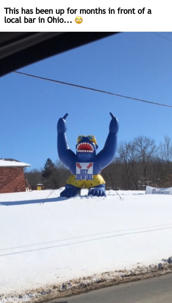 snow - This has been up for months in front of a local bar in Ohio... Dewle. Bullseye