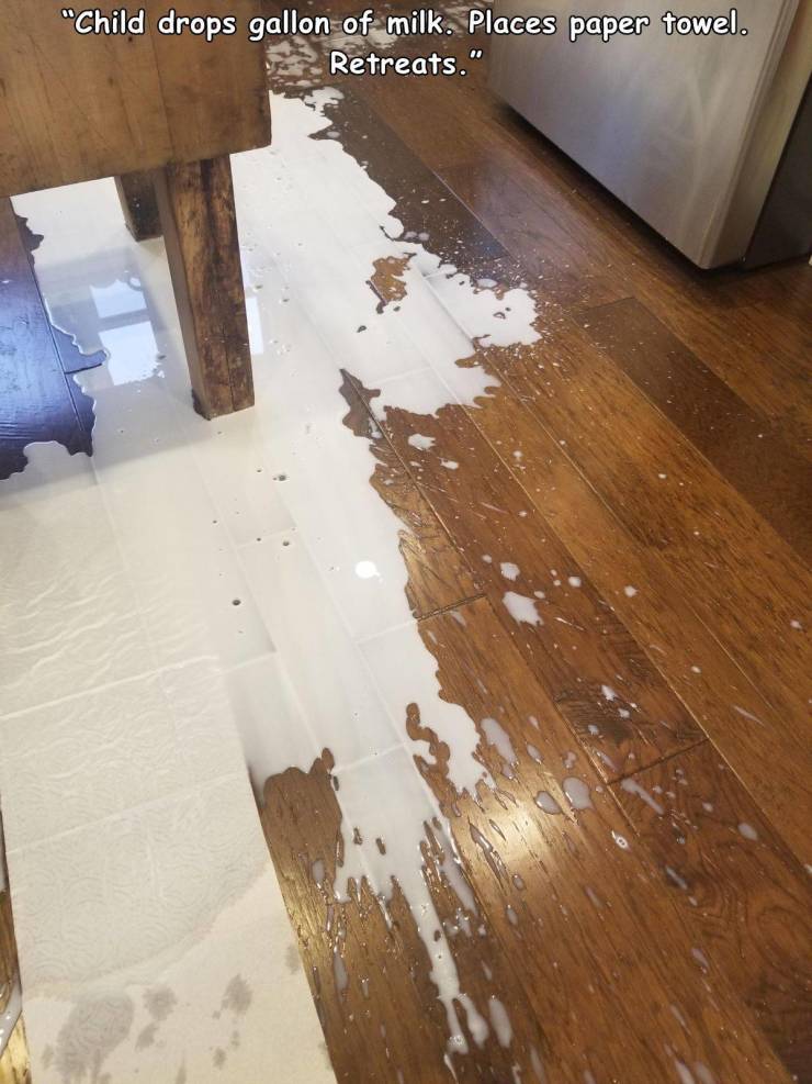 floor - "Child drops gallon of milk. Places paper towel. Retreats."