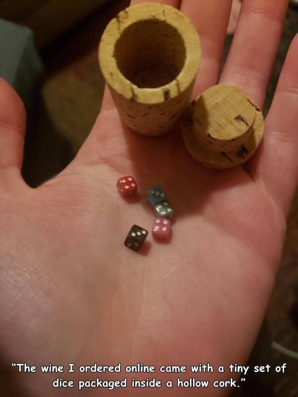 funny pics and memes - jewellery - "The wine I ordered online came with a tiny set of dice packaged inside a hollow cork."