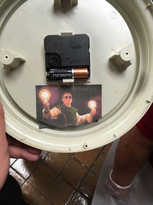 “A Co-Worker Posted Pictures Of Himself In Random Places When He Quit. This Is The Back Of A Clock, And He Quit 2 Years Ago”