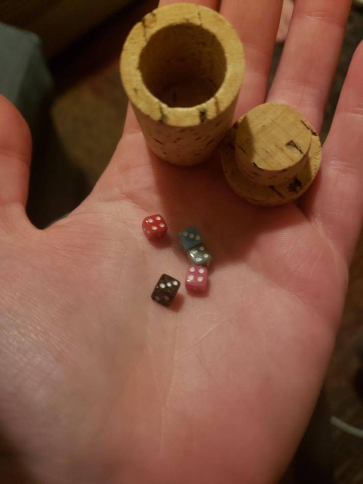 “The wine I ordered online came with a tiny set of dice packaged inside a hollow cork.”