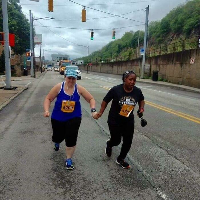 The Last Two Runners In The Pittsburgh Marathon Not Letting Each Other Quit. Obtain Your Goal No Matter What