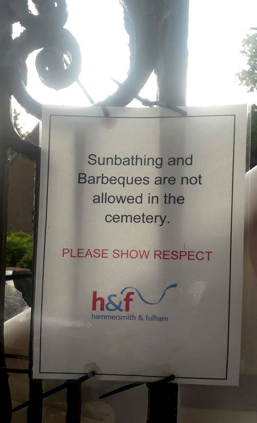 sign - Sunbathing and Barbeques are not allowed in the cemetery. Please Show Respect h&fr hammersmith & fulham