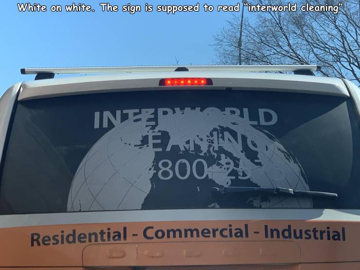 windshield - White on white. The sign is supposed to read interworld cleaning Interiorld 800 Residential Commercial Industrial