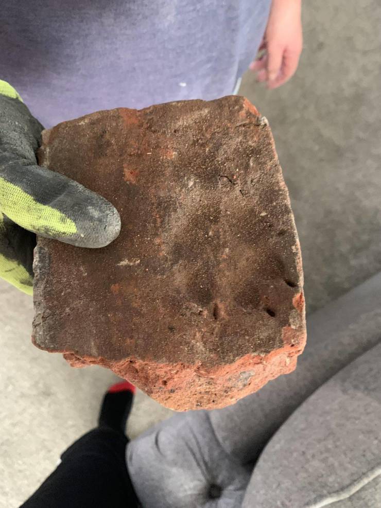 “A 300-year-old brick with a paw print in it.”