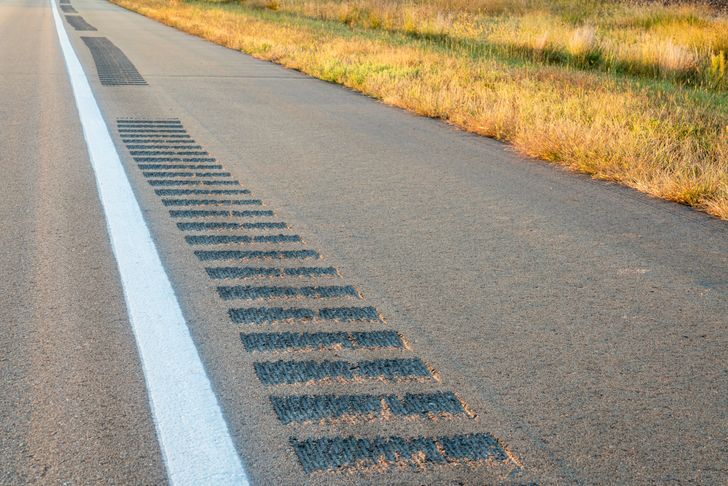 These little bumps on some roads and highways are there for good reason. They’re also known as sleeper lines, and they’re a road safety feature that alerts drivers of potential danger with a noticeable vibration and rumble. They can be applied along the direction of travel on an edge line or centerline, alerting drivers if they drift from their lane.