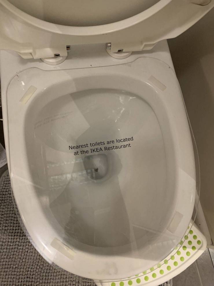 “IKEA display toilets have directions to the real toilets.”