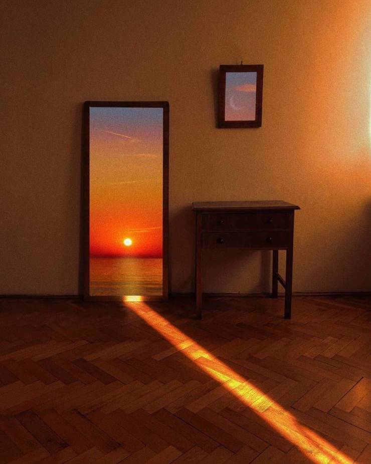 funny pics and memes - light beam sunset hitting mirror