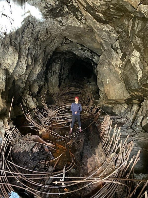 Found while trail running. What are these things? There’s rotten wood that goes along it that looks cut/altered by man. Would it be for making a flat surface to easily maneuver the mine?

A: It’s a collapsed wood-stave pipeline, it may have been for dewatering the mine.