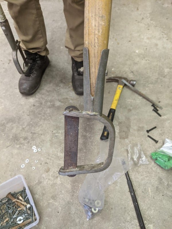 This tool is in a shed that we are cleaning out, belongs to a trail maintenance conservation corps

A: It’s a Swedish clearing axe. Judging the design, it would allow you to bring spare blades into the field where sharpening is time consuming and dangerous. Especially where roots are close to rocks.