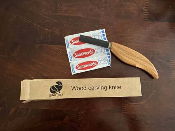 Wood carving knife that comes with bandages.