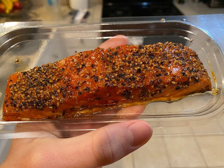 “This imported salmon, so tightly wrapped in plastic it appears to not be wrapped at all.”