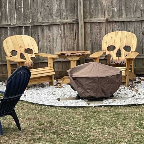 “My neighbor made these skull adirondack chairs and a matching table.”