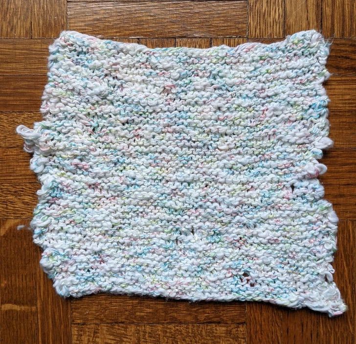 “About 9 months ago, my husband asked me to teach him to knit. I present to you a washcloth that was finally bound off today.”