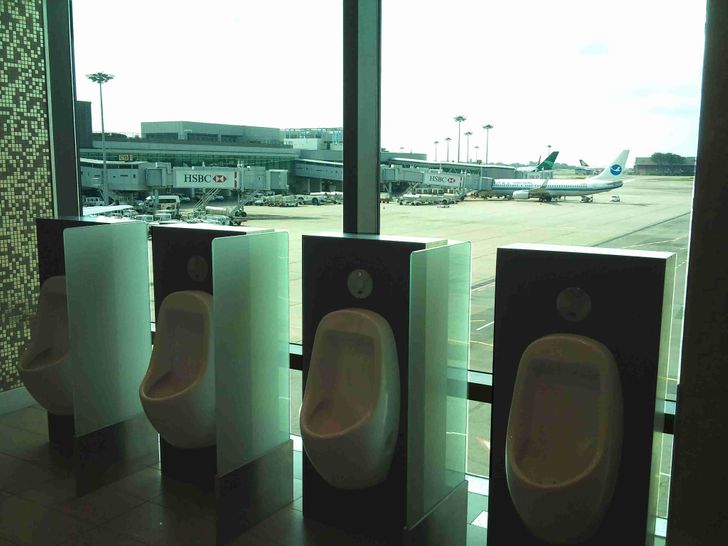 funny airport pics - urinals at windows at airport