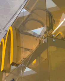 funny airport pics - automated mcdonald's food delivery inside airport