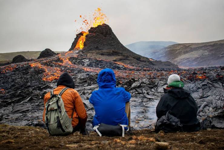 funny pics - people watching volcano erupt