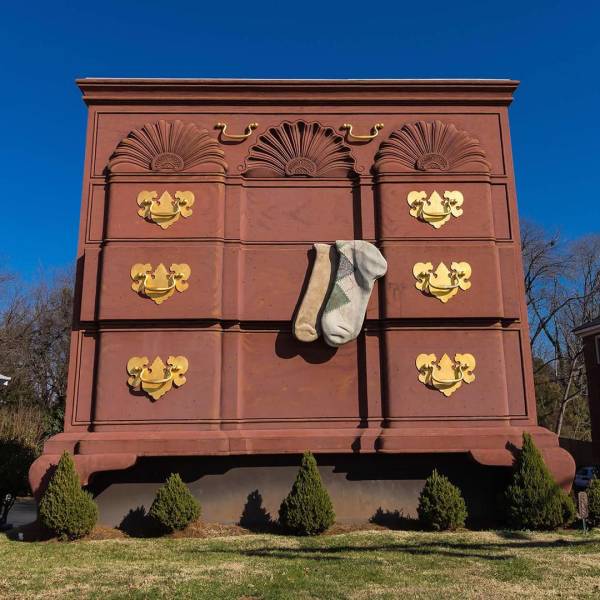 funny pics - giant dresser sculpture with large socks