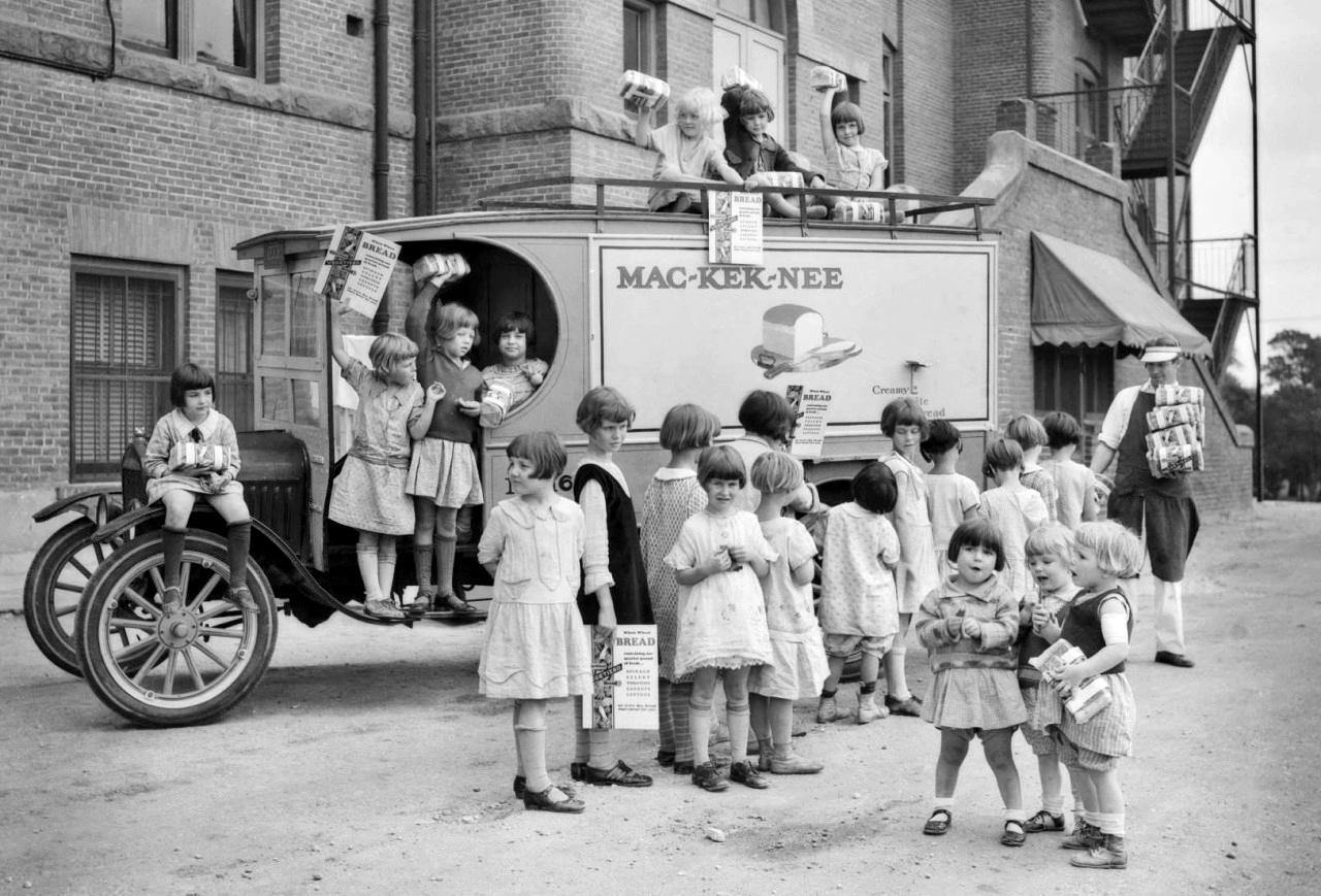 Children receive free loaves of Thomas’ Vegetated Whole Wheat Bread, Los Angeles, 1928