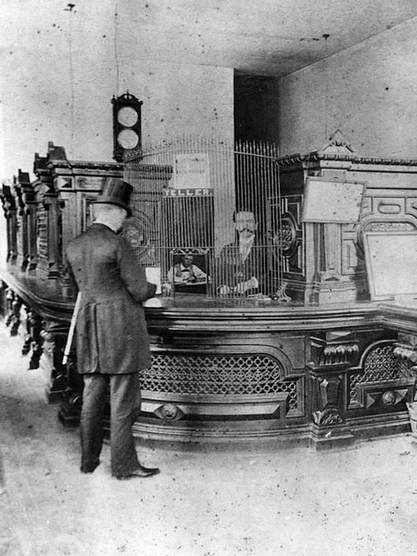 Teller in the First National Bank of Austin approximately 1910